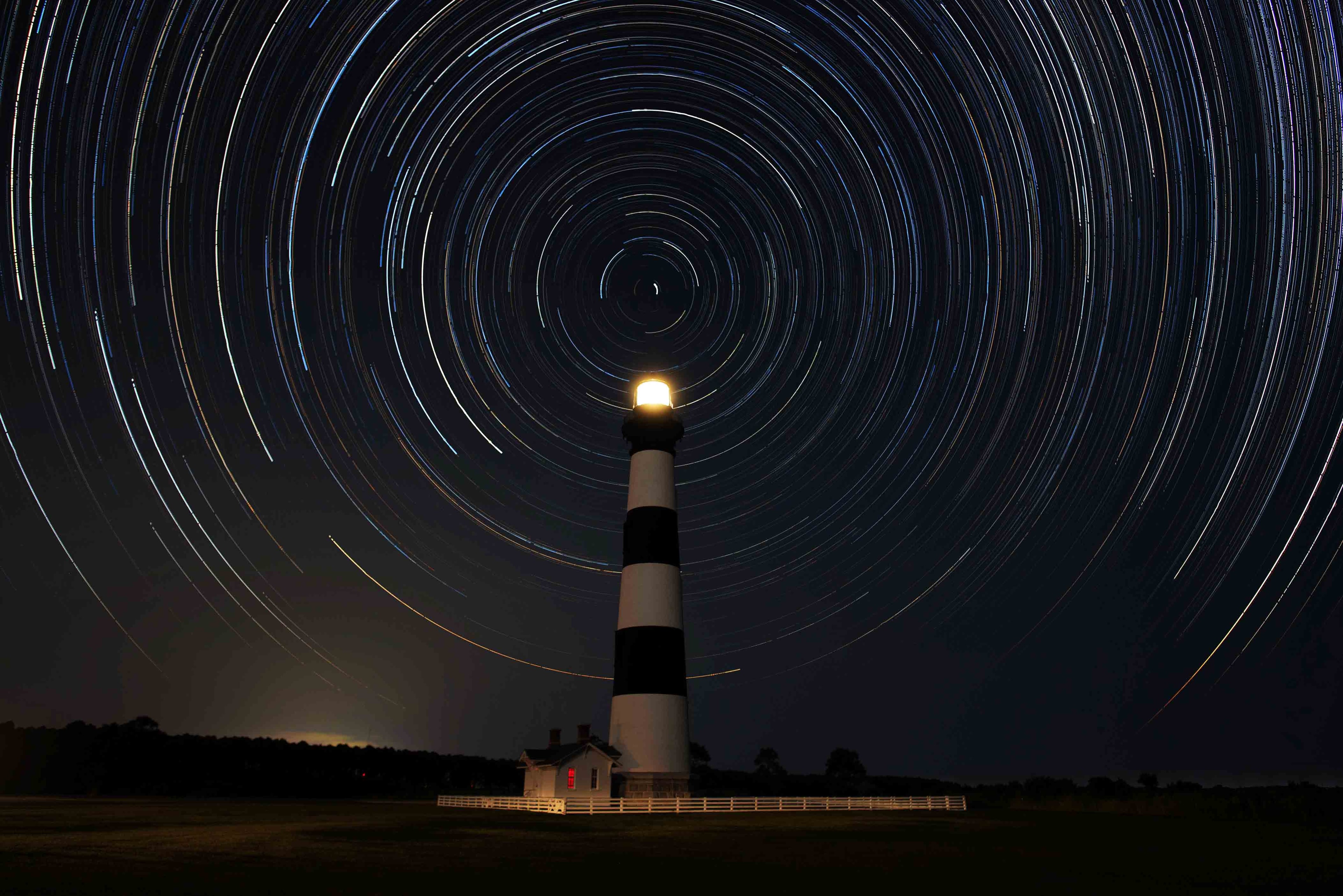 Bodie Island Lighthouse with circular star trails overhead